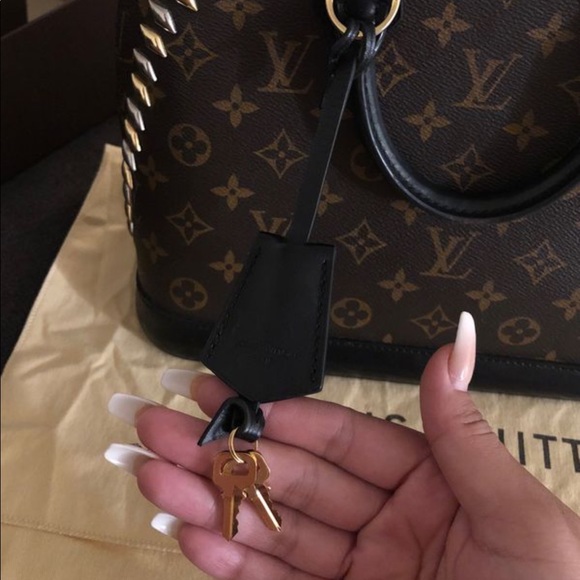 Louis Vuitton Alma purse with spikes - Picture 2 of 7